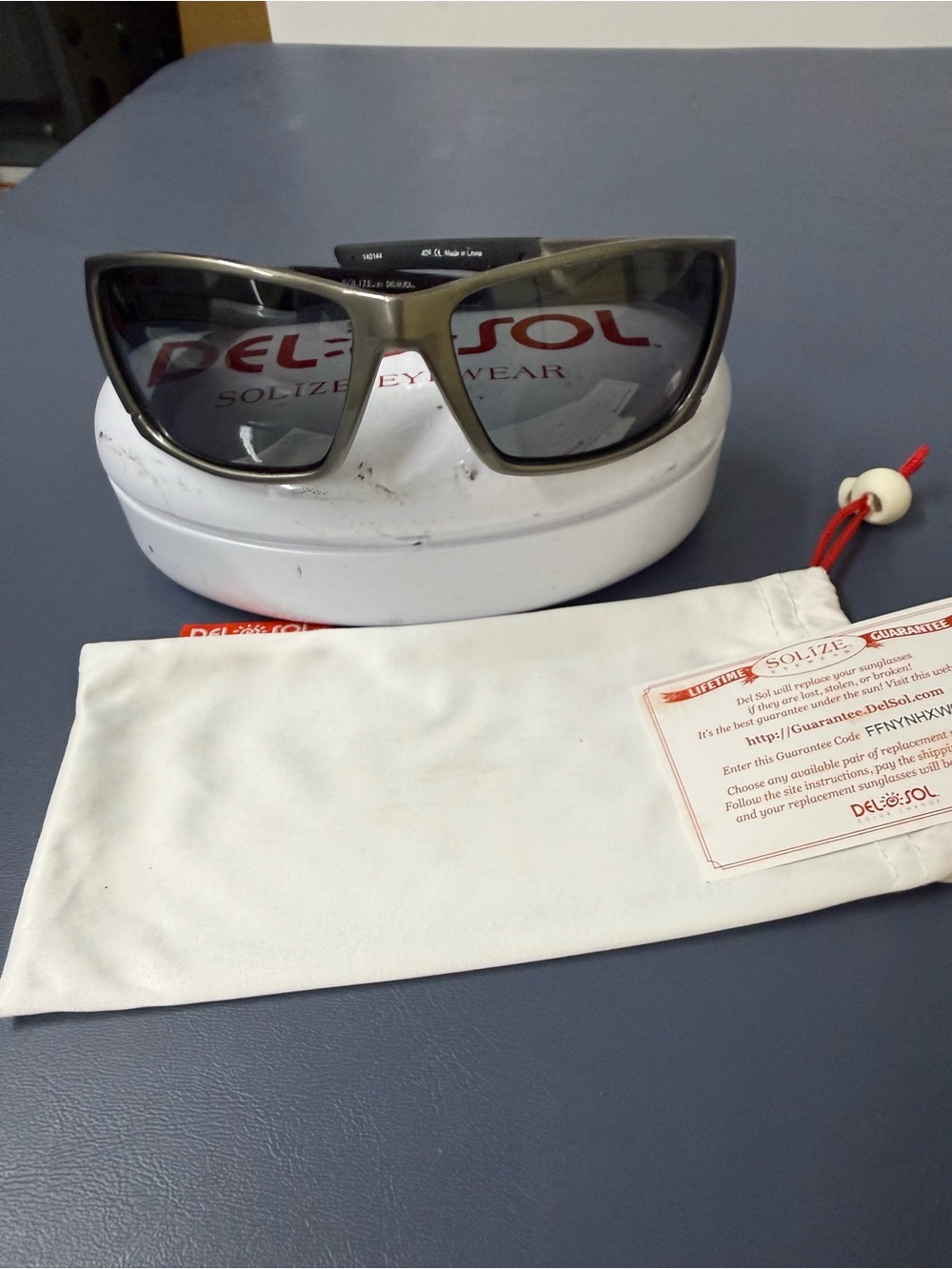 Del Sol Sunglasses Guarantee Card with Soft Pouch